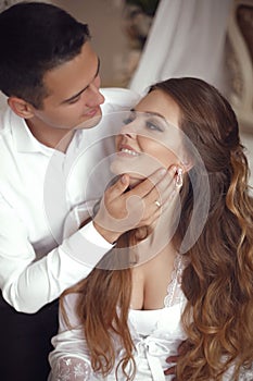 Happy newlywed couple wedding portrait. Beautiful bride and hand