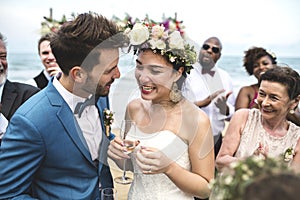 Happy newlyweds at beach wedding