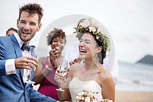 Happy newlyweds at beach wedding