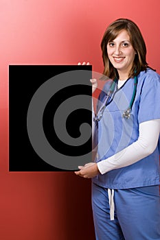 Happy Nurse With Sign