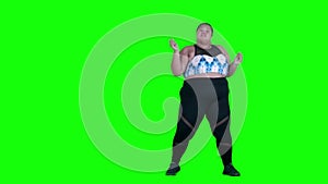 Happy obese woman dancing in the studio