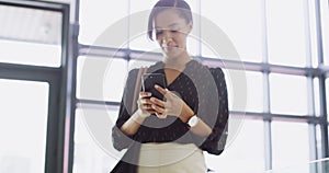 Happy, office and business woman with phone call in lobby for plan, networking or communication. Smartphone