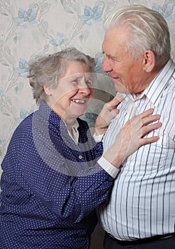 Happy old couple laugh