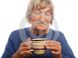 Happy old lady with coffee