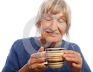 Happy old lady with coffee