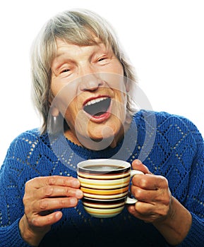 Happy old lady with coffee