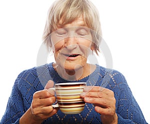 Happy old lady with coffee