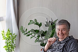 happy old lady posing at home indoor, positive single senior retired female sitting on veranda