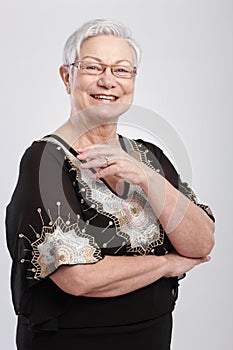 Happy old woman in evening dress