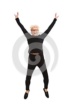 Happy old woman jumping.