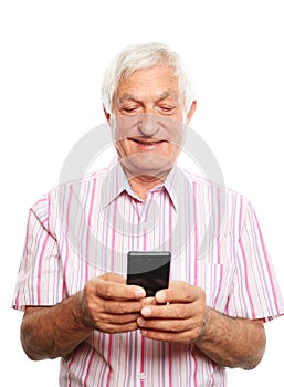 Happy older man using smartphone. Grandfather typing message for grown up kids, reading sms with good news