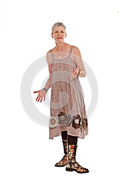 Happy older woman in flowered boots and dress