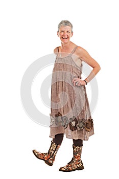 Happy older woman in flowered boots and dress