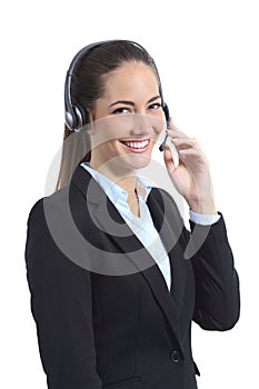 Happy operator with headset attending on the phone photo