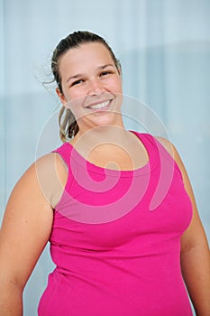 Happy overweight woman