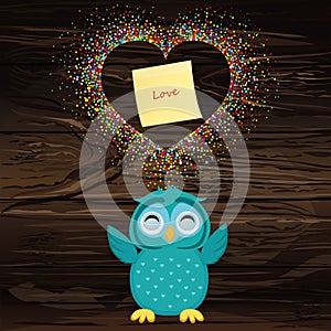 A happy owl throws a multicolored confetti in the shape of a hea