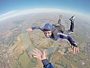 Happy parachutist smiling in freefall