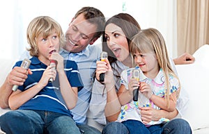 Happy parents and children having fun together