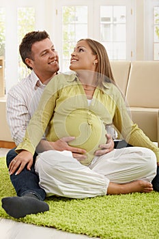 Happy parents expecting baby