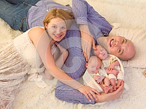 Happy parents of newborn twins