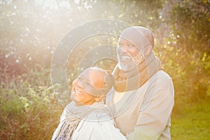 Happy peaceful senior couple embracing