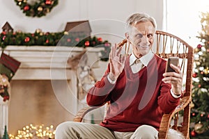 Happy pensioner having festive mood