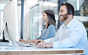 Happy people, call center and team in customer service, support or telemarketing on computer at the office. Woman and