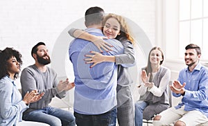 Happy People Embracing And Applauding To Each Other After Therapy Session