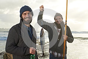 Happy, people and fishing portrait at sea with pride for tuna catch at sunset. Fisherman, friends and smile holding fish