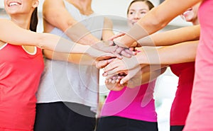 Happy people in the gym celebrating victory