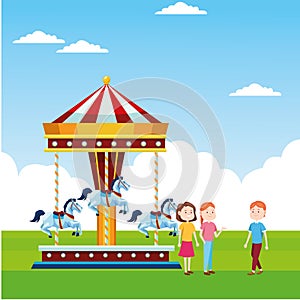 Happy people and horses carousel over landscape background