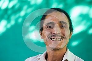 Happy People Portrait Of Latino Man With Goatee Laughing