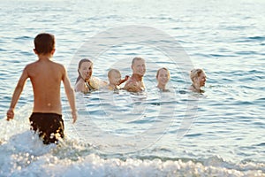 Happy people in the sea