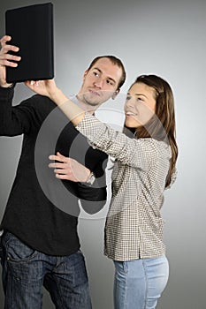 Happy people showing on computer