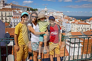 Happy people, visiting Lisbon during summer holiday, family with children