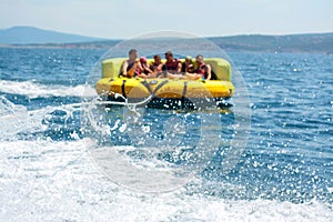 Happy people on water attractions