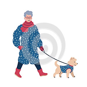 Happy pet owner walking a dog on a leash in winter time. Isolated vector illustration.