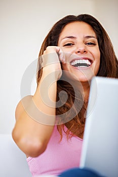 Happy, phone call and portrait of woman laughing at comic, funny or comedy joke in conversation at home. Smile