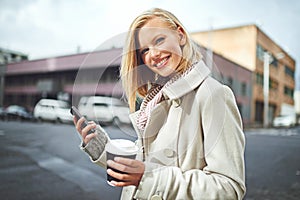 Happy, phone and portrait of woman with coffee in city for commute, walking and journey in street. Travel, fashion and