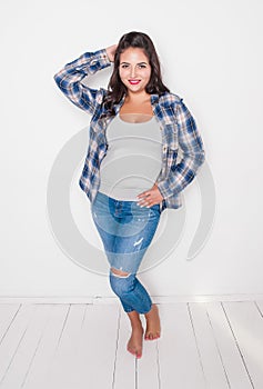 Happy plus size woman barefoot. Body positive concept