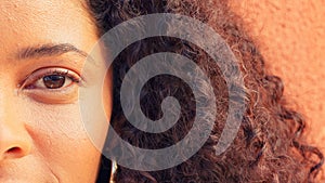 Happy, portrait and face of black woman laughing and excited after natural hair care treatment on curly afro. Beauty