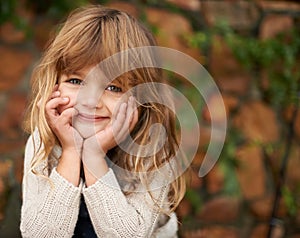 Happy, portrait and girl child in garden for learning, fun or playing on vacation, break or holiday in nature. Face