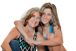 Happy portrait of a happy mother and her teen daughter