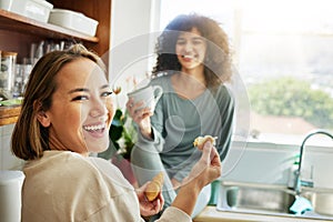 Happy, portrait and a lesbian couple with breakfast in the kitchen for eating, hungry and coffee. Smile, house and gay