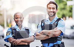 Happy, portrait and police with arms crossed in the city for security, safety and justice on the street. Team, pride and