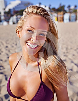 Happy, portrait and woman in bikini on beach for holiday or vacation in Florida for summer and travel. Swimwear, style