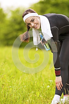 Happy Positive Caucasian Fit Woman Outdoors Making Training Exercise.