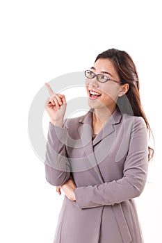 Happy, positive female business executive, business woman pointing up