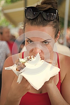 Happy preatty girl or Woman eating sandwich gyros.