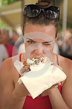 Happy preatty girl or Woman eating sandwich gyros.